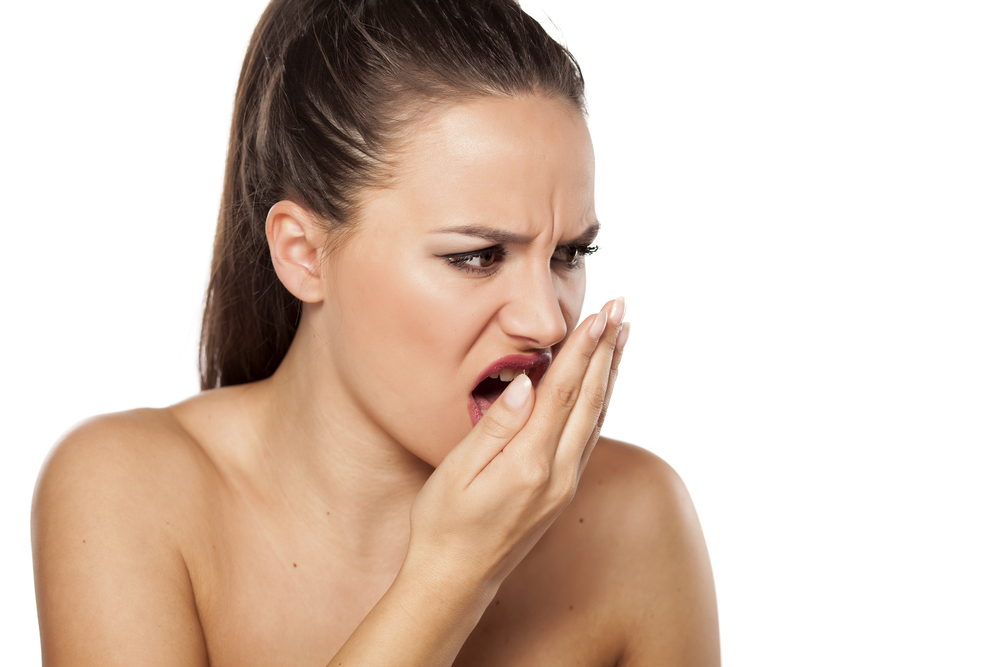 Какие болезни могут выдавать неприятный запах изо рта